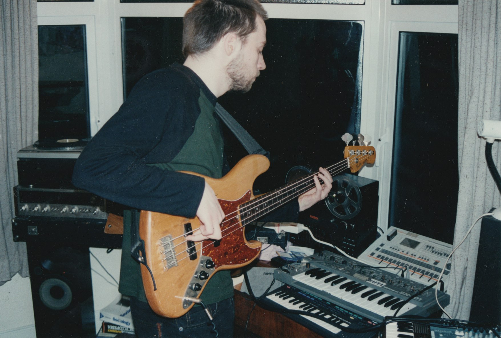 Tom Jenkinson (aka Squarepusher) playing bass. Photo courtesy of Warp Records.